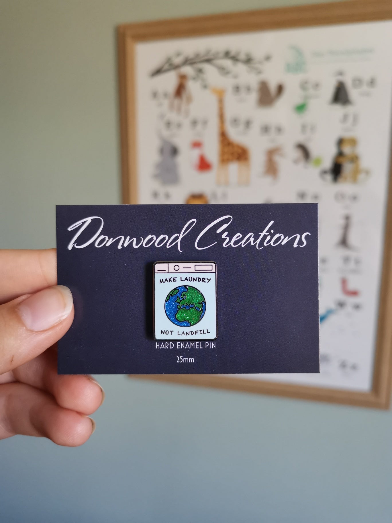 Laundry not Landfill Pin Badge by Donwood Creations